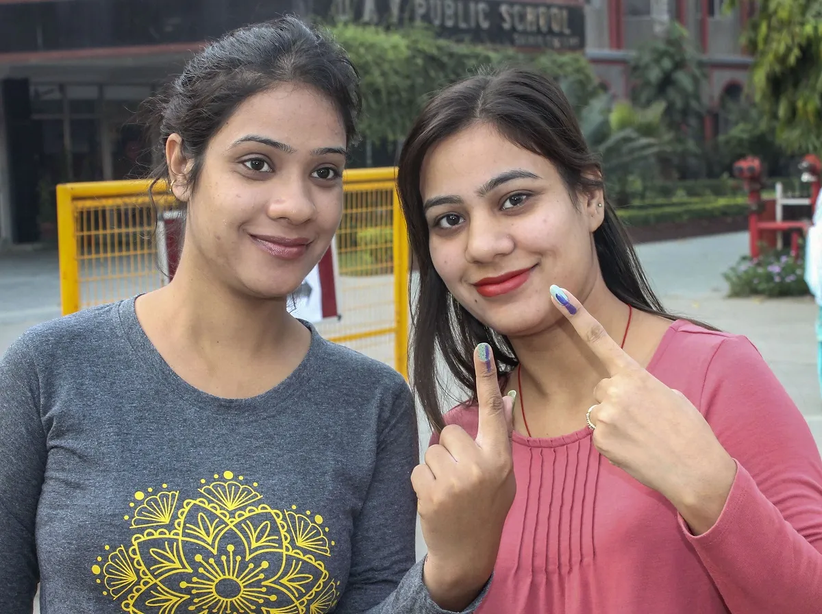 Voters show their inked fingers after casting their votes...- India TV Hindi