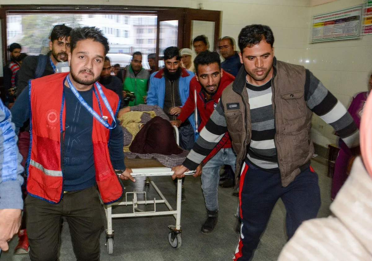  An injured civilian being shifted to SHMS hospital...- India TV Hindi