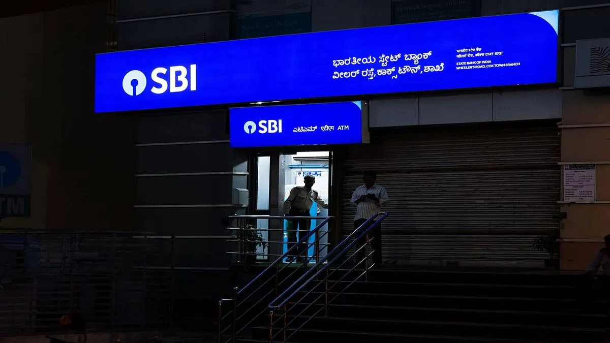 SBI plans to sell 1 pc stake in NSE; invites bids- India TV Paisa