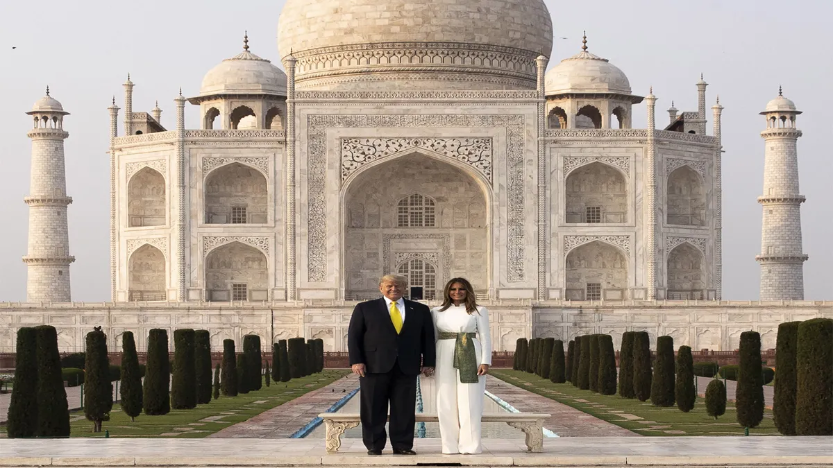 President Donald Trump along with first lady Melania Trump poses for photographs at the Taj Mahal- India TV Hindi