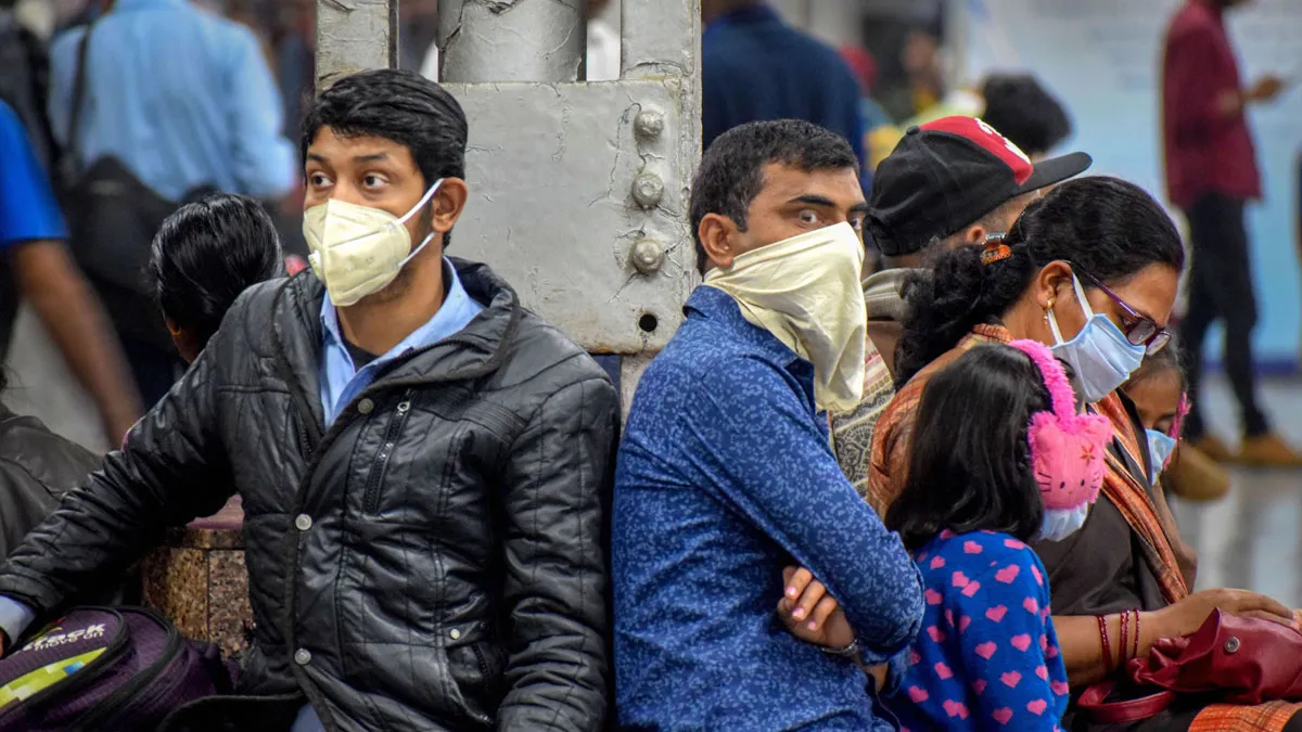 Passengers wear masks in the wake of coronavirus pandemic,...- India TV Hindi
