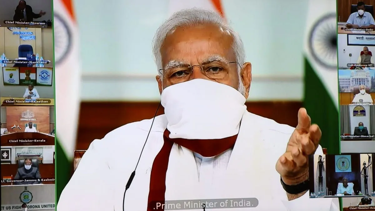 PM Modi wears cloth mask as he chairs video conference with...- India TV Hindi