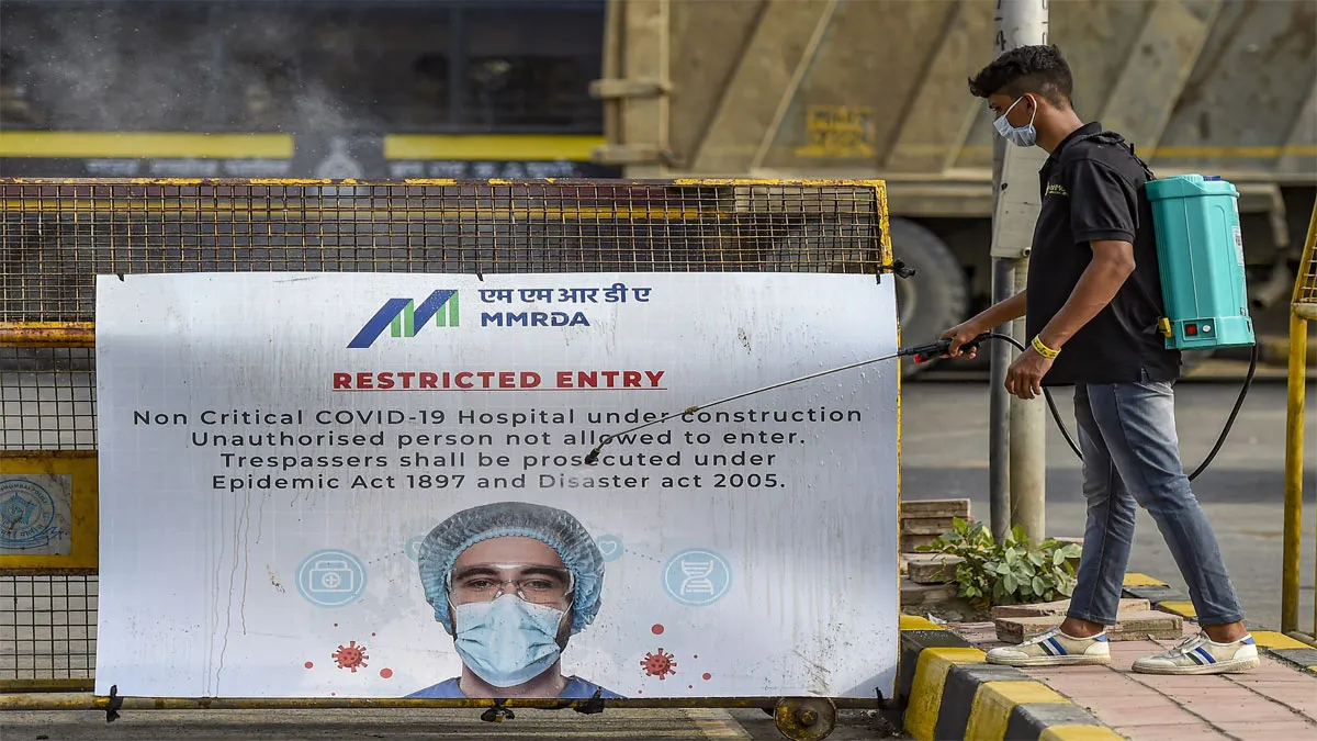 Mumbai: A worker sanitises outside India's first open...- India TV Hindi
