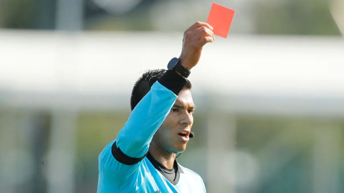 A football player can be shown a red card when coughing - International Football Association Board- India TV Hindi