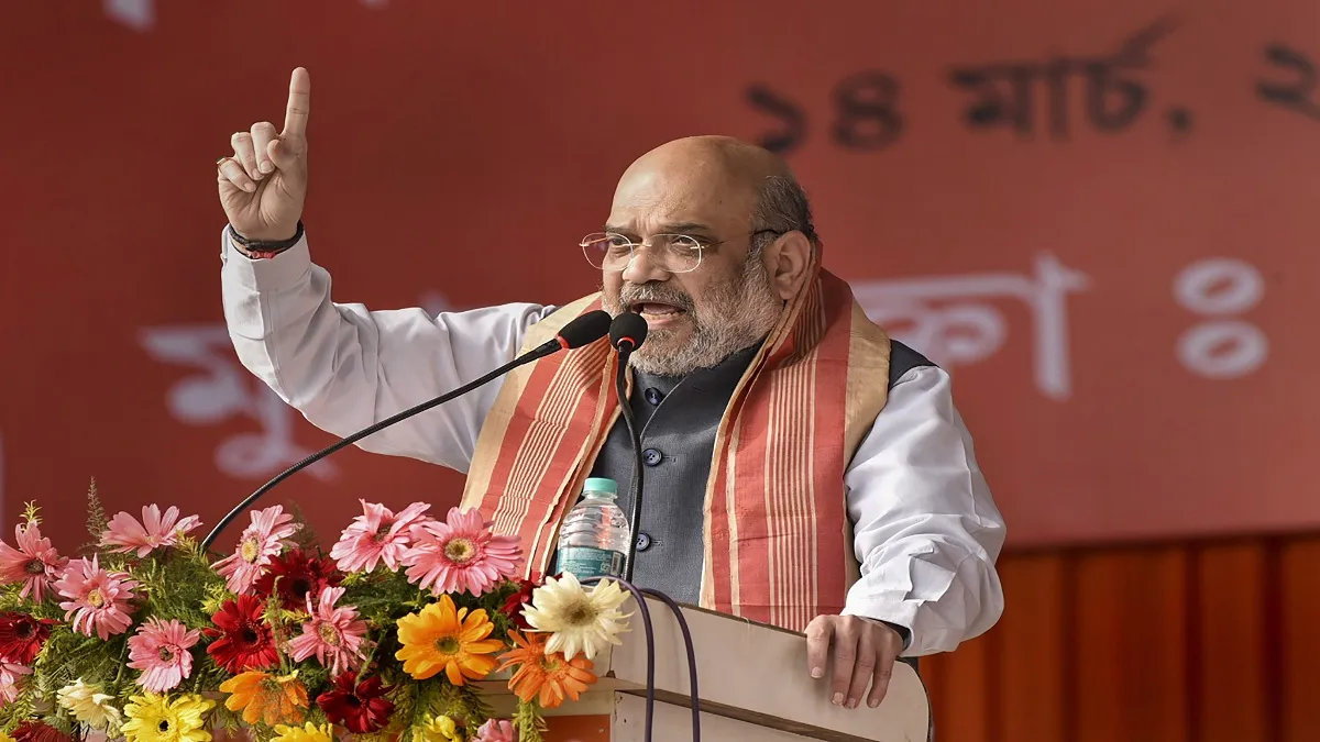 Home Minister Amit Shah addresses an election campaign rally ahead of the Assam Assembly Polls, at M- India TV Hindi