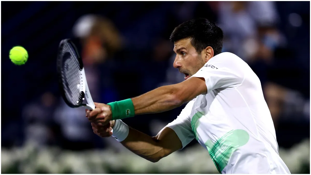 : Novak Djokovic of Serbia plays a shot against Lorenzo Musetti of Italy- India TV Hindi