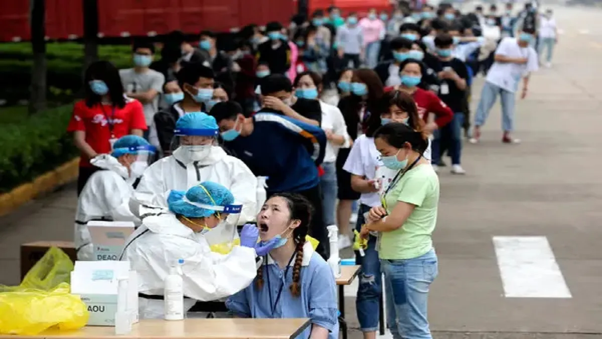 Coronavirus testing at a factory in Wuhan, China, in May.- India TV Hindi