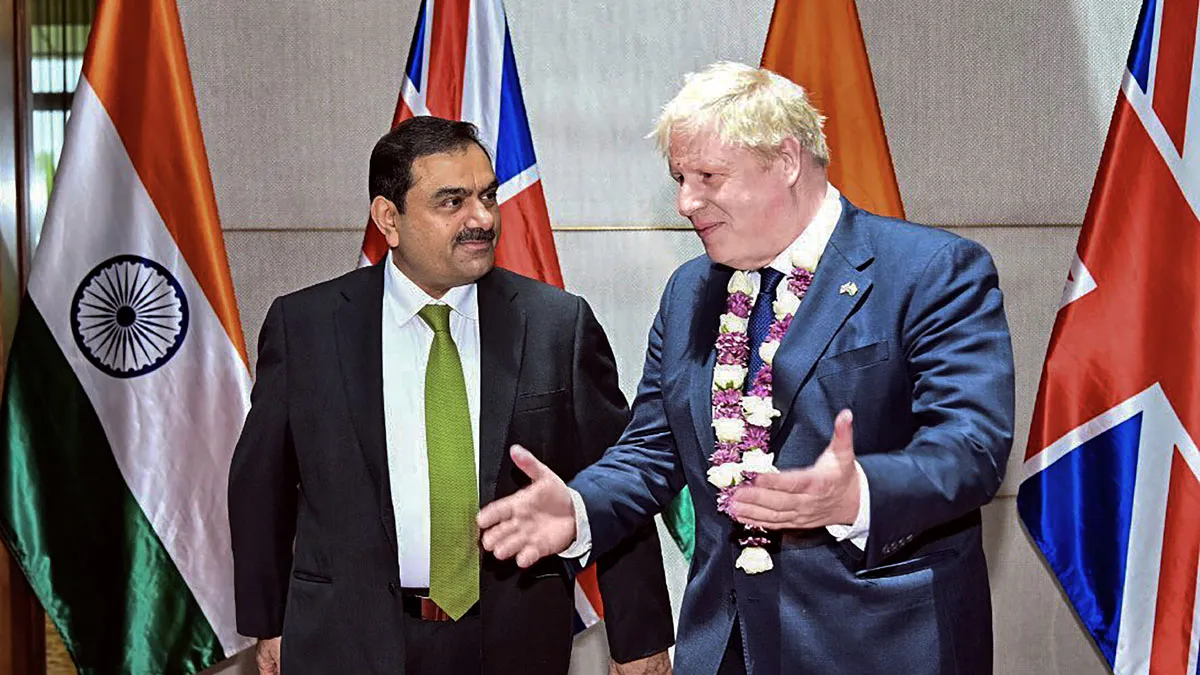 Gautam Adani with Boris Johnson - India TV Paisa