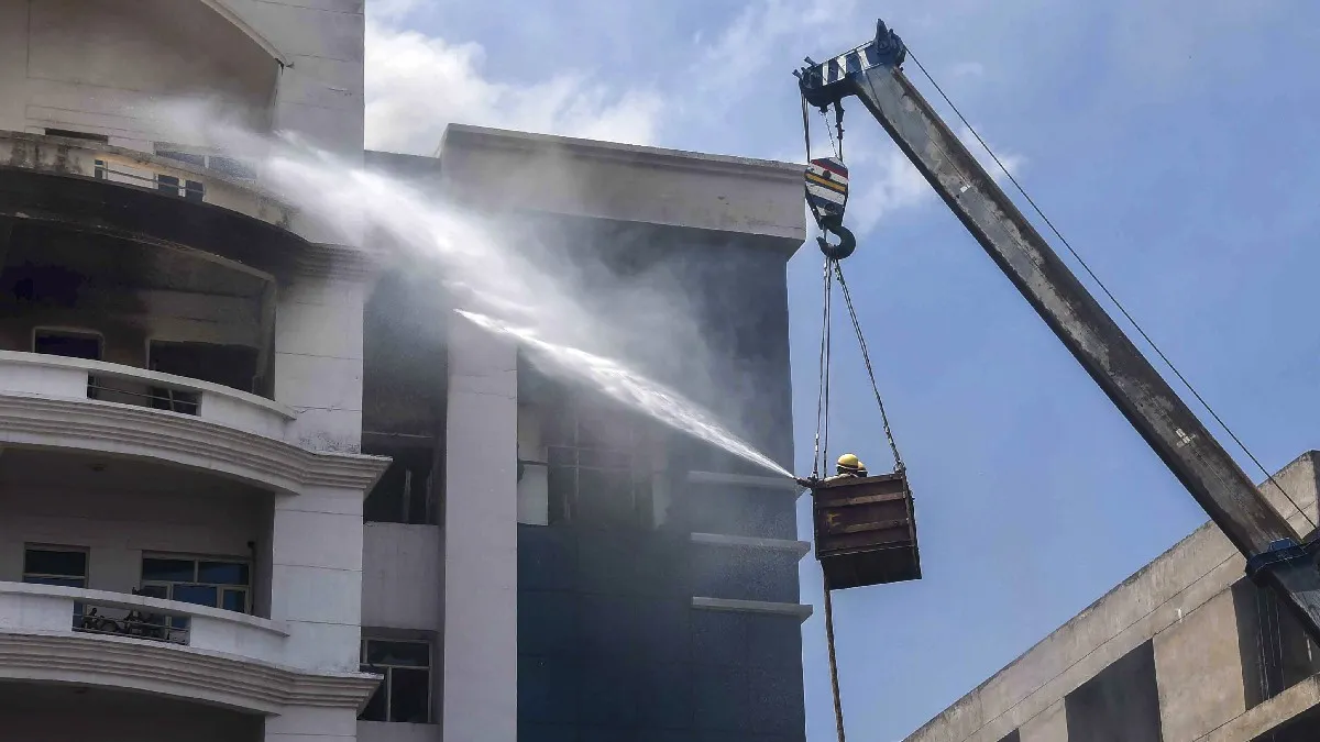 Firefighters try to douse a fire that broke out at Advocate General Office in Ambedkar Bhawan- India TV Hindi