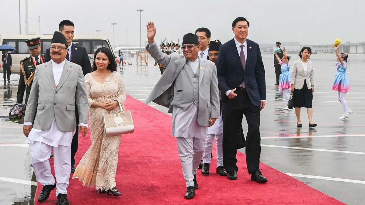 चीन दौरे से लौटे नेपाल के पीएम प्रचंड। - India TV Hindi