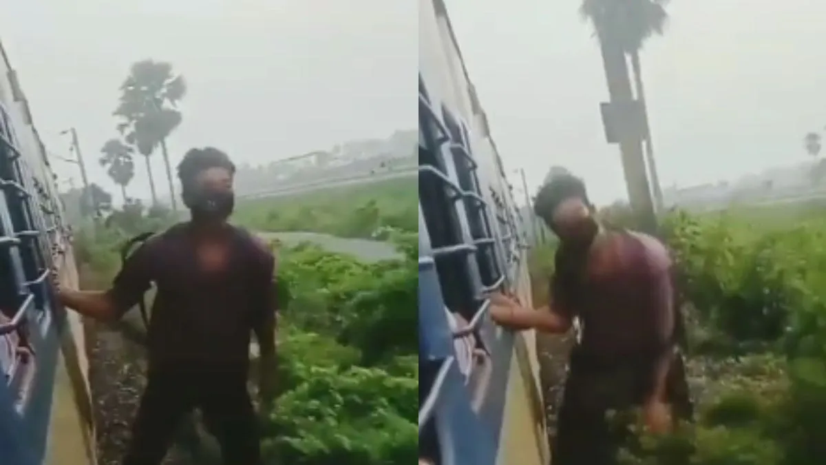 चलती ट्रेन के गेट पर शख्स ने किया खतरनाक स्टंट- India TV Hindi