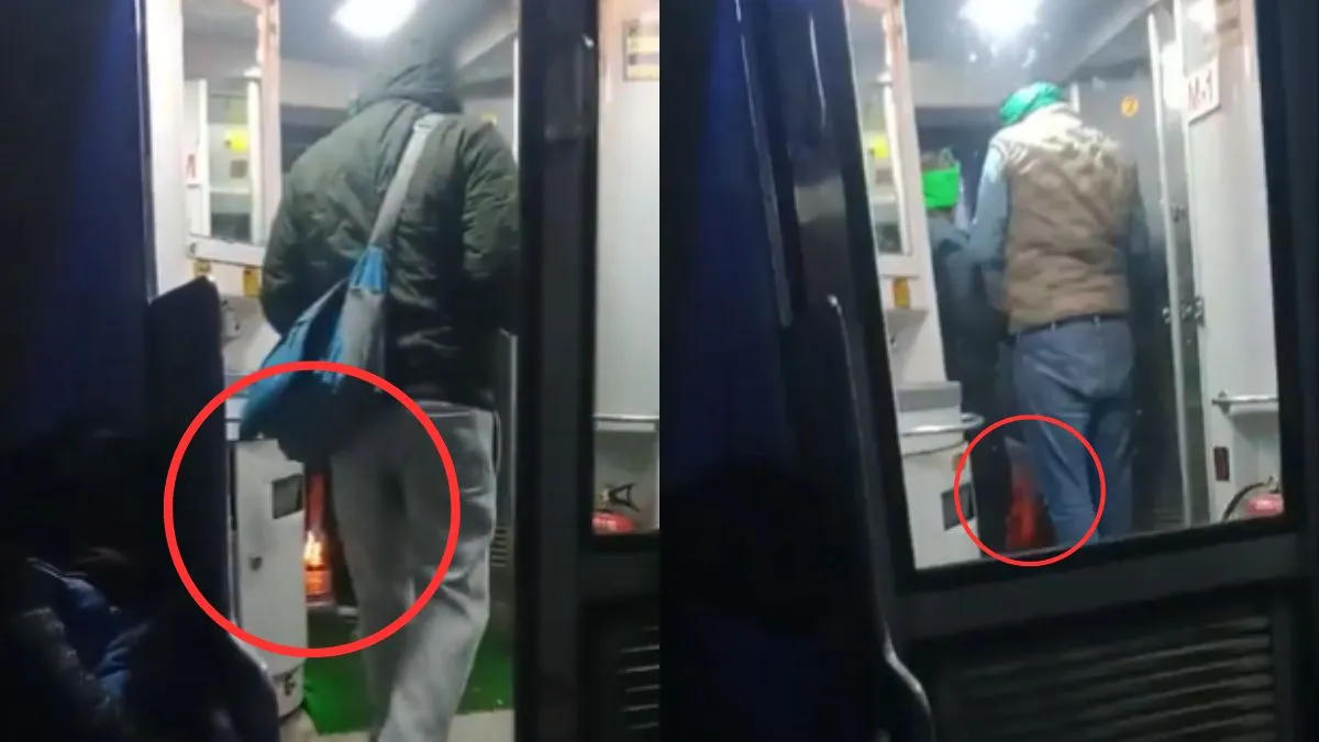 ट्रेन में आग तापते लोग।- India TV Hindi