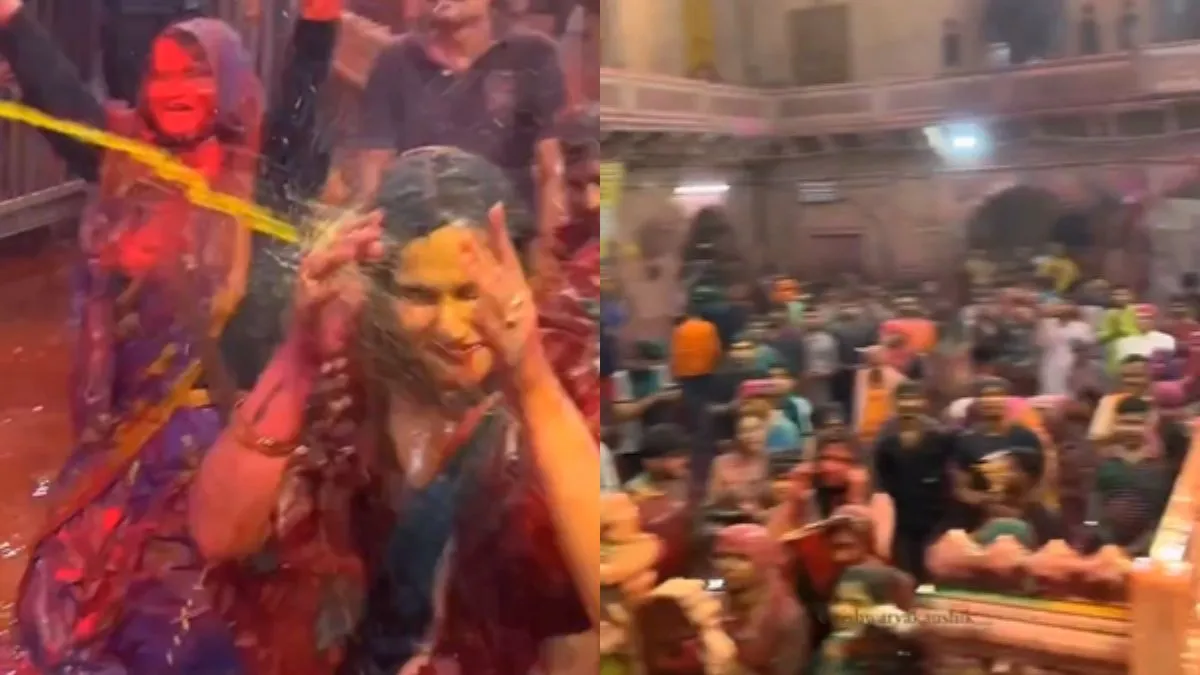 मंदिर में होली खेलते हुए भक्त- India TV Hindi