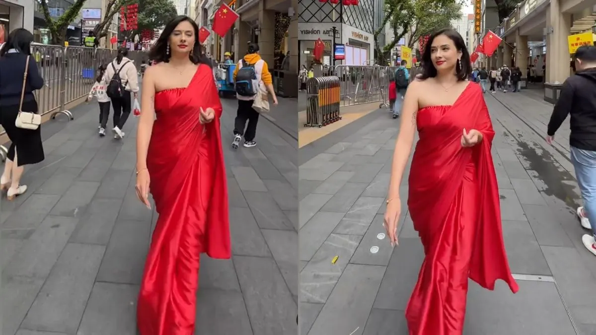 लाल साड़ी में चीन की सड़कों पर दिखी महिला- India TV Hindi