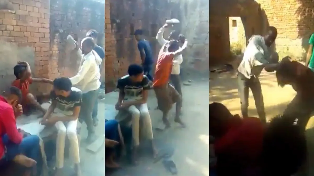 बेटे की पिटाई करता हुआ शख्स- India TV Hindi