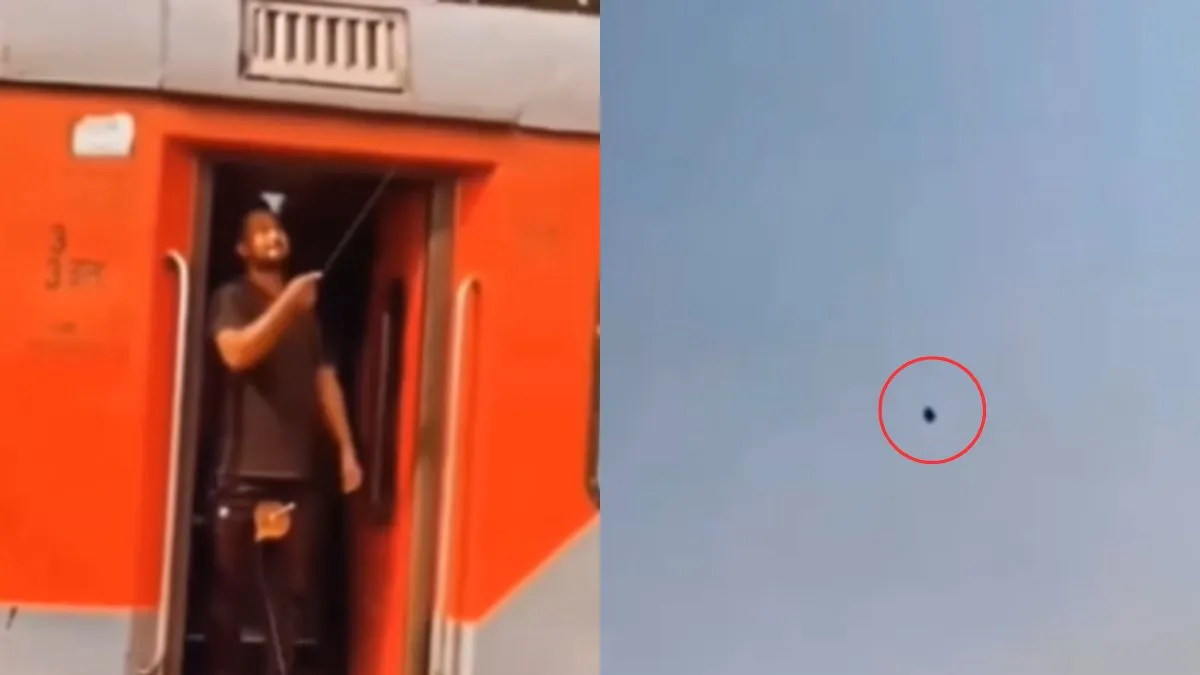 ट्रेन की गेट पर खड़े होकर पतंग उड़ाता शख्स- India TV Hindi
