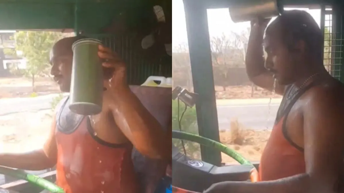 वाहन चलाते समय खुद पर पानी डालता दिखा ड्राइवर- India TV Hindi