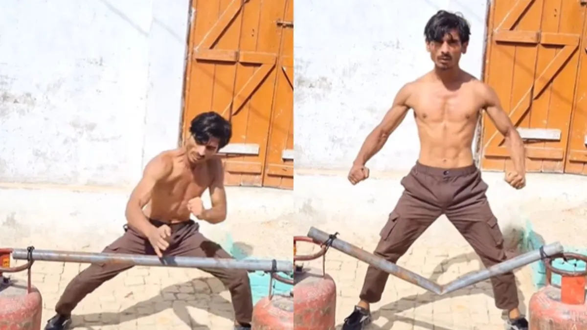 शख्स ने अपने हाथ से लोहे का पाइप मोड़ा- India TV Hindi