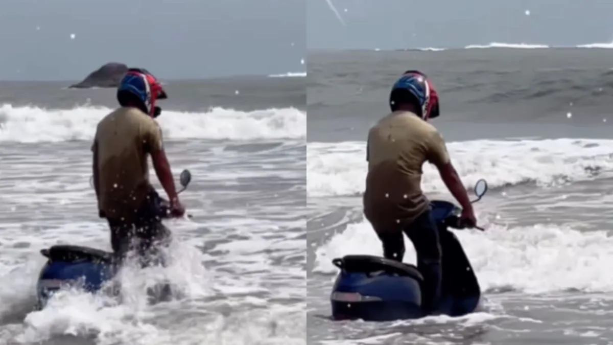 समुद्र में स्कूटी लेकर चल पड़ा शख्स - India TV Hindi