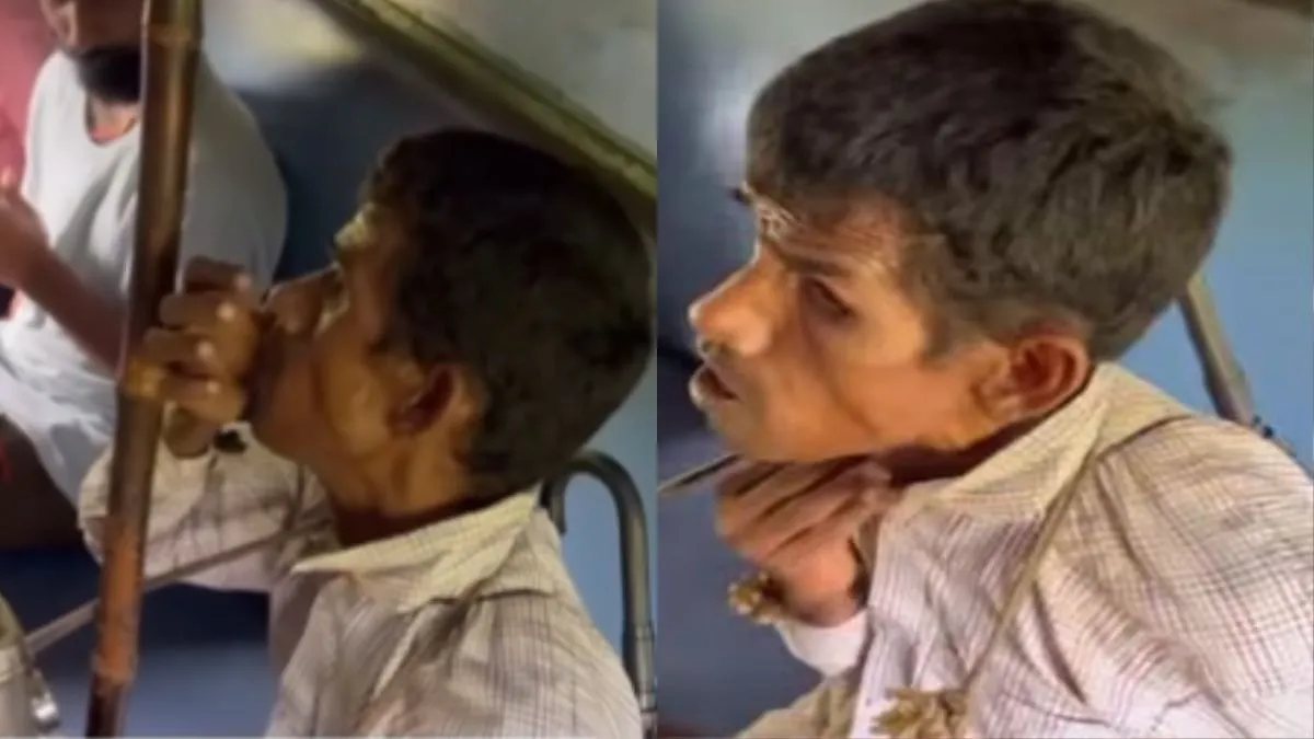 नेत्रहीन शख्स ट्रेन में अपना हुनर दिखाते हुए- India TV Hindi