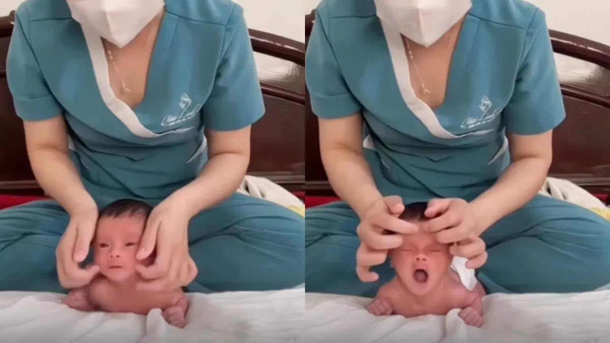 बच्चे को सुलाती हुई नर्स- India TV Hindi