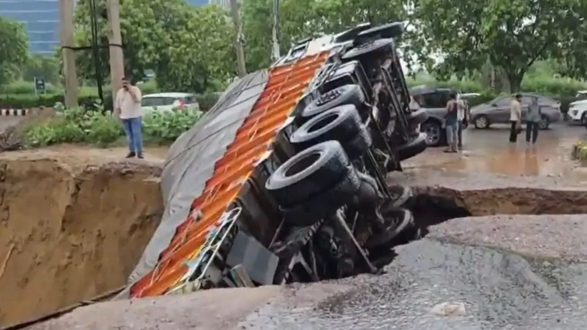 Gurugram heavy rain, road collapse Gurugram, truck accident Gurugram
