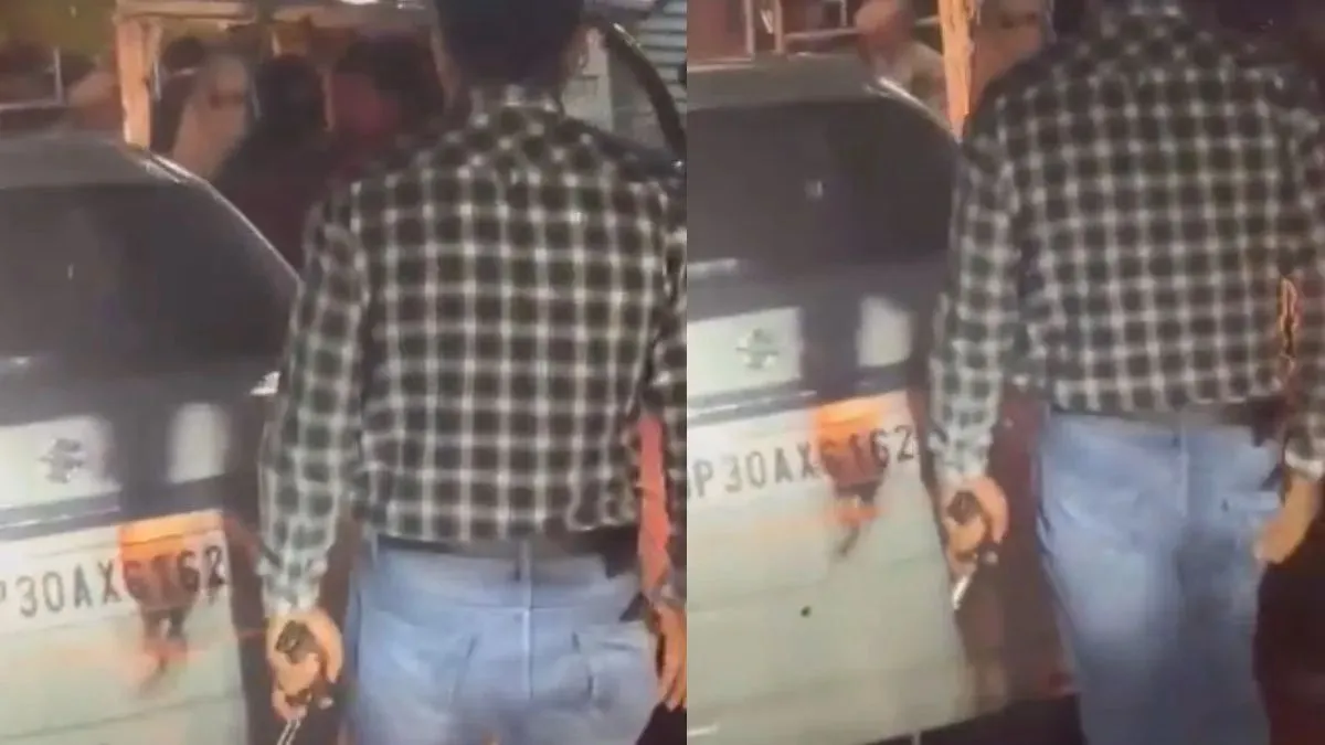 हाथ में पिस्टल लहराता दिखा शख्स।- India TV Hindi