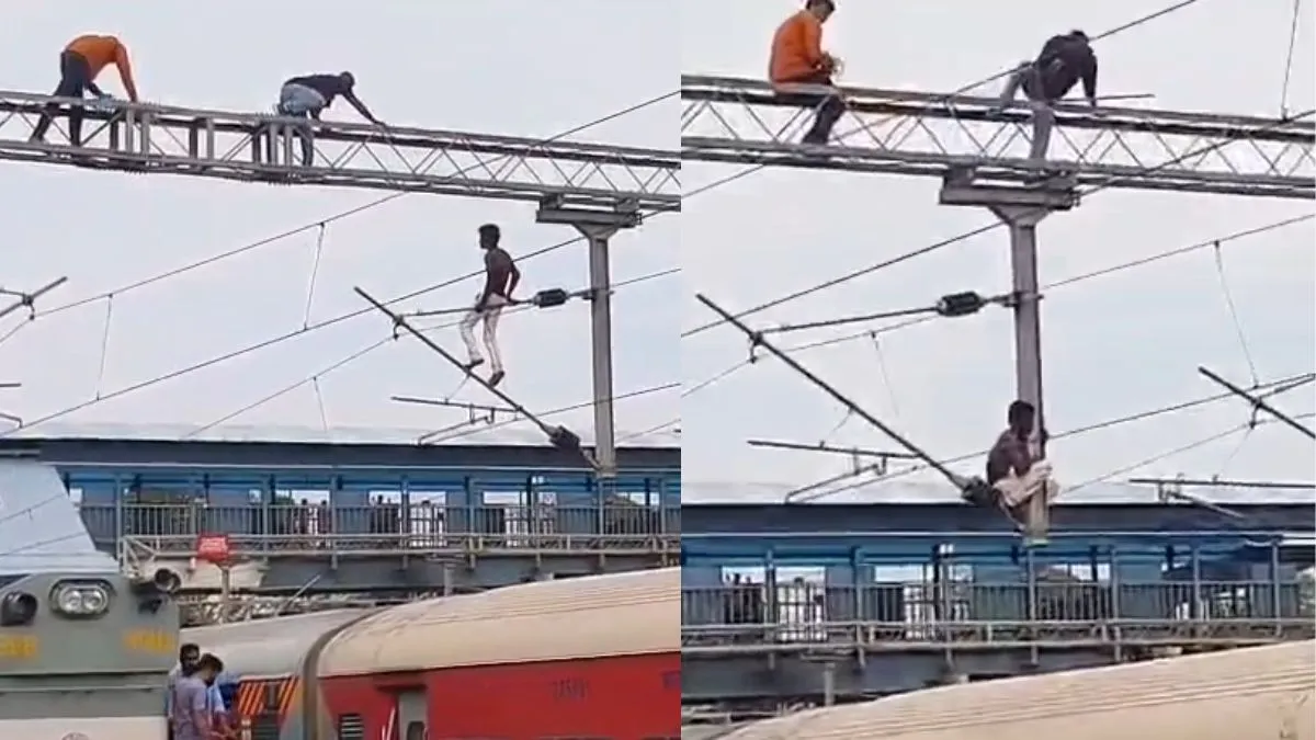 बिजली के खंभे पर चढ़ा युवक।- India TV Hindi