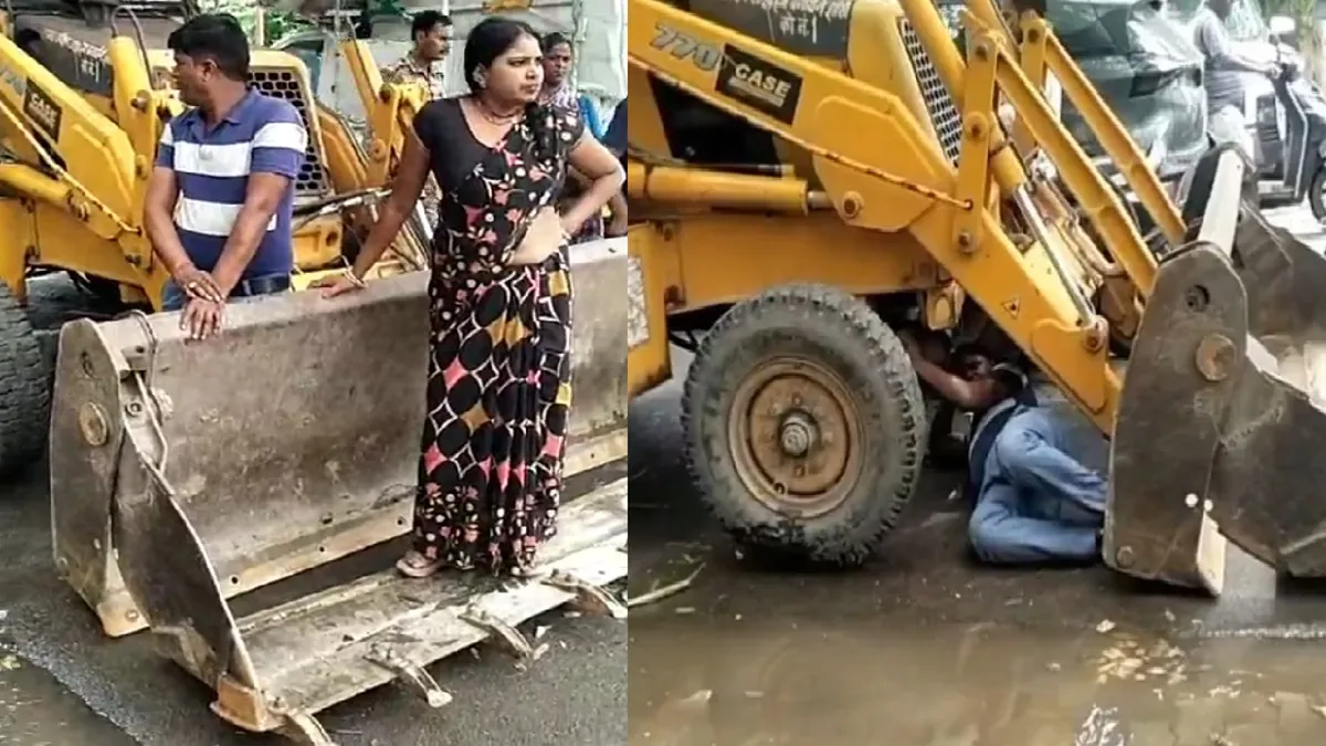 बुलडोजर के ऊपर चढ़ी महिला और नीचे लेटा पति- India TV Hindi