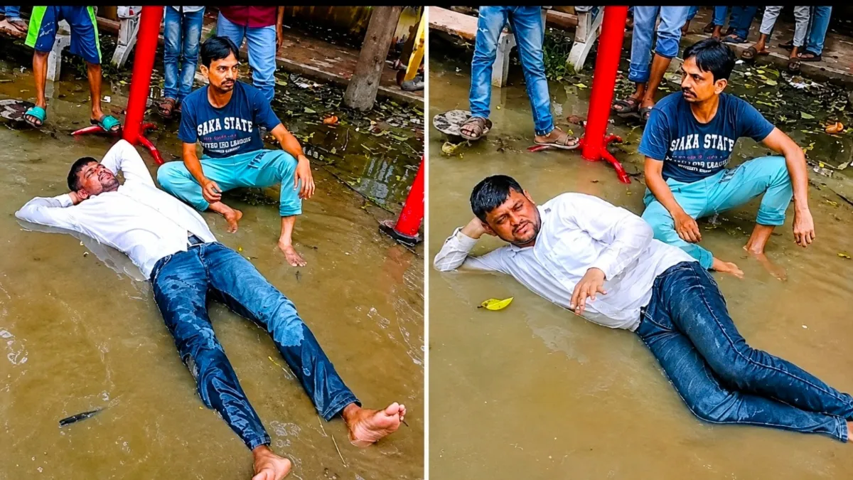 कानपुर के पार्क में अनोखा विरोध प्रदर्शन, गंदे पानी में लेट गया पार्षद; बोला - अफसर आएं और समस्या सुलझाएं