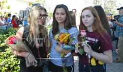 People hold vigil for victims of Florida school shooting | AP Photo- India TV Hindi