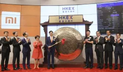 Xiaomi shares fall in Hong Kong trading debut - India TV Paisa