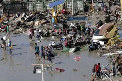 <p>PALU: People survey outside the shopping mall which was...- India TV Hindi