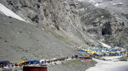 <p>Hindu devotees on their way to the holy cave shrine of...- India TV Hindi