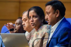 Finance Minister Nirmala Sitharaman with Finance secretary Rajiv Kumar during a press conference to - India TV Paisa