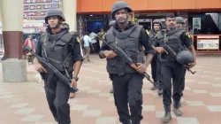 Commando force personnel conduct checking at a railway station in Coimbatore.- India TV Hindi