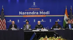 Prime Minister Narendra Modi and Union Railways Minister Piyush Goyal (2L) during a roundtable meeti- India TV Paisa