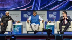 Union Telecom Minister Ravi Shankar Prasad flanked by Telecom Secretary Anshu Prakash (L) and Aditya- India TV Paisa