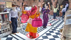 <p>Vrindavan: Devotees, adhering to social distancing...- India TV Hindi