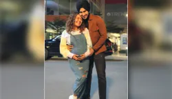 Neha Kakkar is pregnant flaunts baby bump in new pic with husband Rohanpreet Singh- India TV Hindi