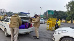 Delhi Police personnel check a vehicle at the New Delhi railway station.- India TV Hindi