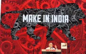 मोदी ने कहा &#8216;Make in India&#8217; अब तक का सबसे बड़ा ब्रांड, स्टेबल टैक्स सिस्टम बनाने का किया वादा- India TV Paisa
