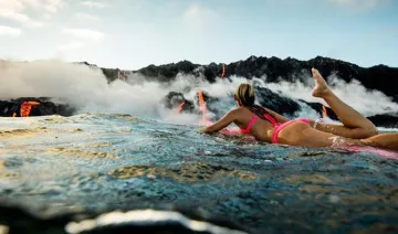Alison teal surfing near active volcano in Hawai- India TV Hindi