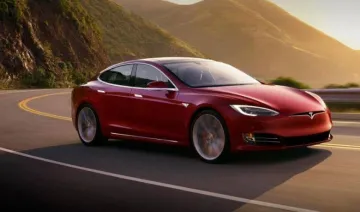 Tesla ने पेश की नई दमदार इलेक्ट्रिक कार 100D, एक बार चार्ज करने पर चलेगी 540 किमी.- India TV Paisa