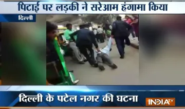 Video-Delhi-traffic-police-caught-on-camera-thrashing-a-man- India TV Hindi