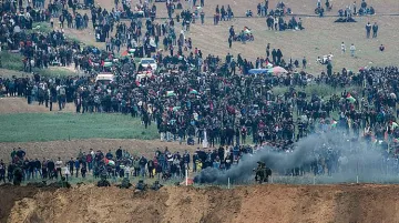 7 Palestinians said killed, 500 hurt in clashes at border | AP Photo- India TV Hindi