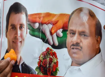<p>A poster of Congress President Rahul Gandhi and JD(S)...- India TV Hindi