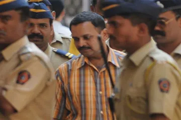 Lt Col Purohit, six others charged with terror conspiracy by NIA court in 2008 Malegaon blasts case- India TV Hindi