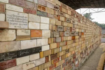 <p>A wall of bricks bearing 'Shri Ram' chants seen at the...- India TV Hindi