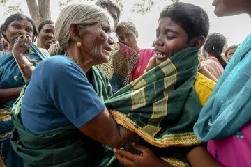 <p>A crying boy being consoled by his grandmother after his...- India TV Hindi